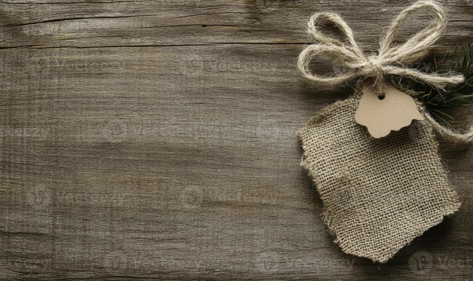 A tag with a tag hanging from a piece of burlock photo