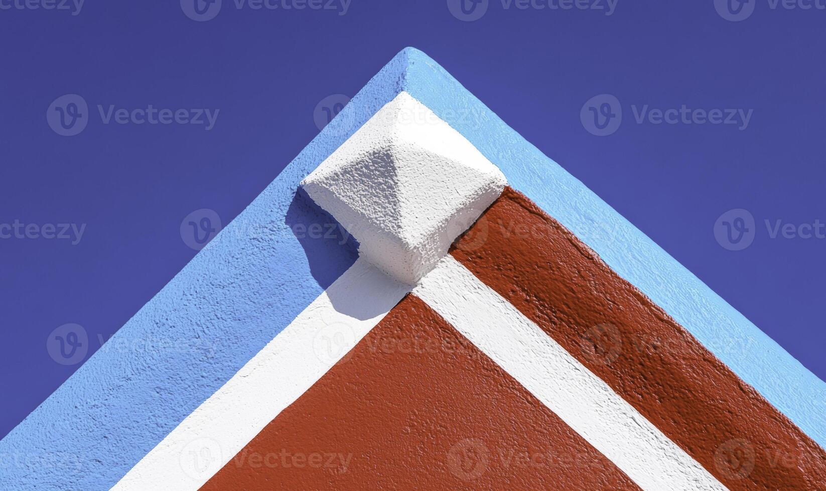 A close up of a red and white painted roof photo