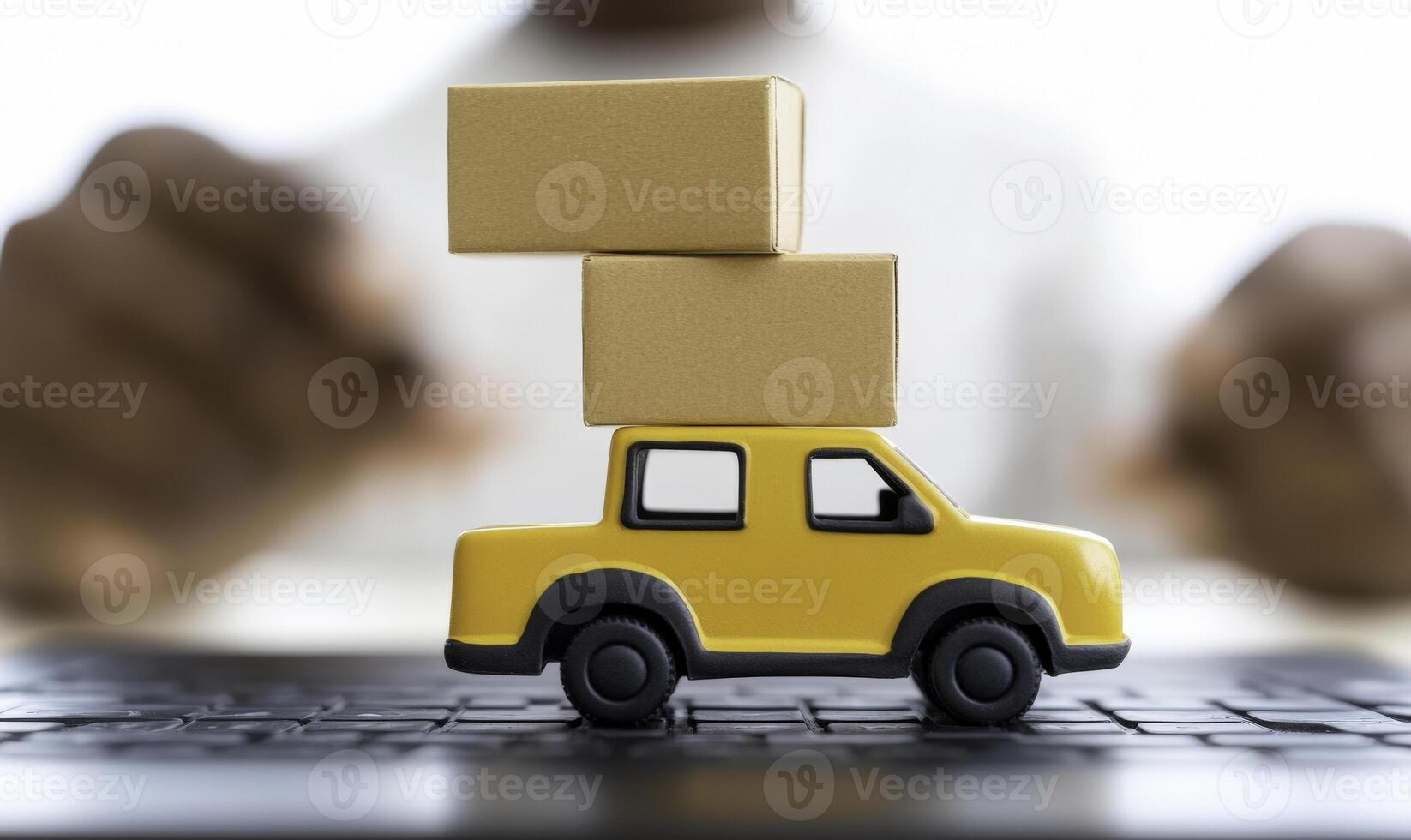 A small toy car with boxes on top of it photo