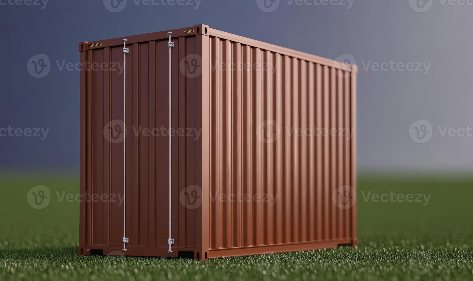 A brown shipping container sitting on top of grass photo