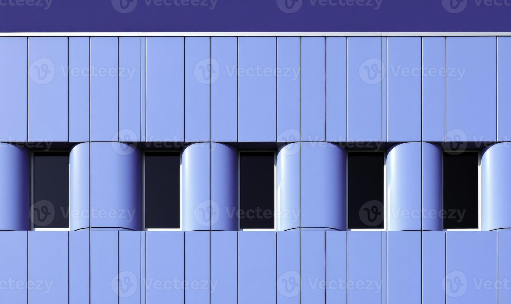 Modern Architectural Design Featuring Blue Facade with Curved Elements and Symmetrical Windows Under Bright Clear Sky photo