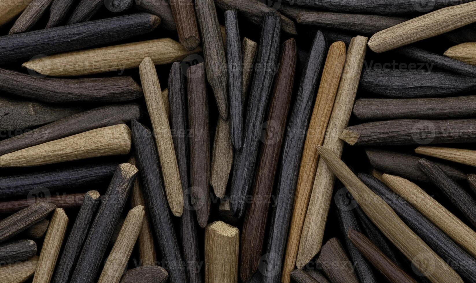 Assorted Natural Wood Sticks in Various Shades of Brown, Black, and Tan Suitable for Crafts, Decoration, and Natural Art Projects photo