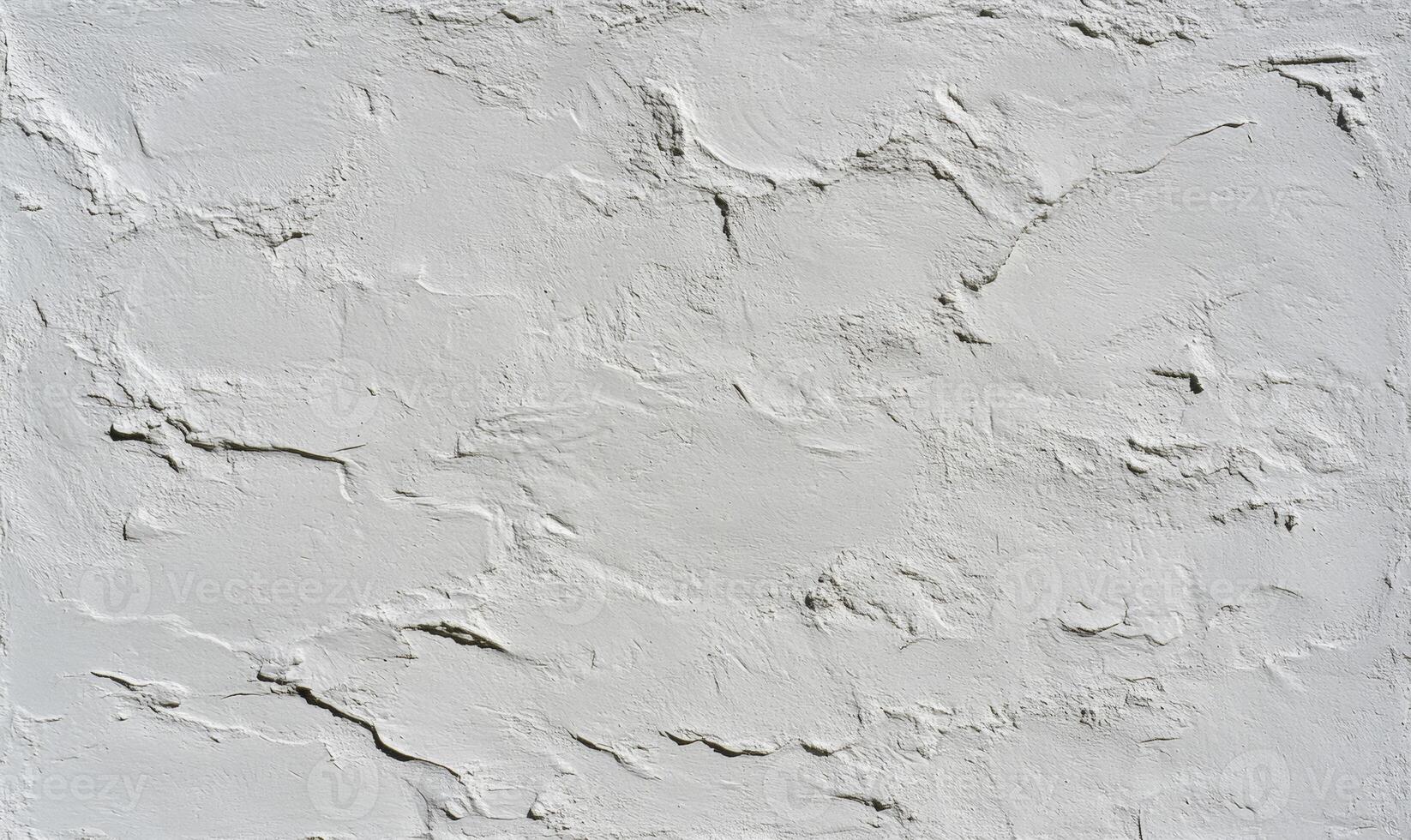 Textured white wall surface with subtle imperfections and uneven patterns for background design and artistic projects in modern spaces and applications photo