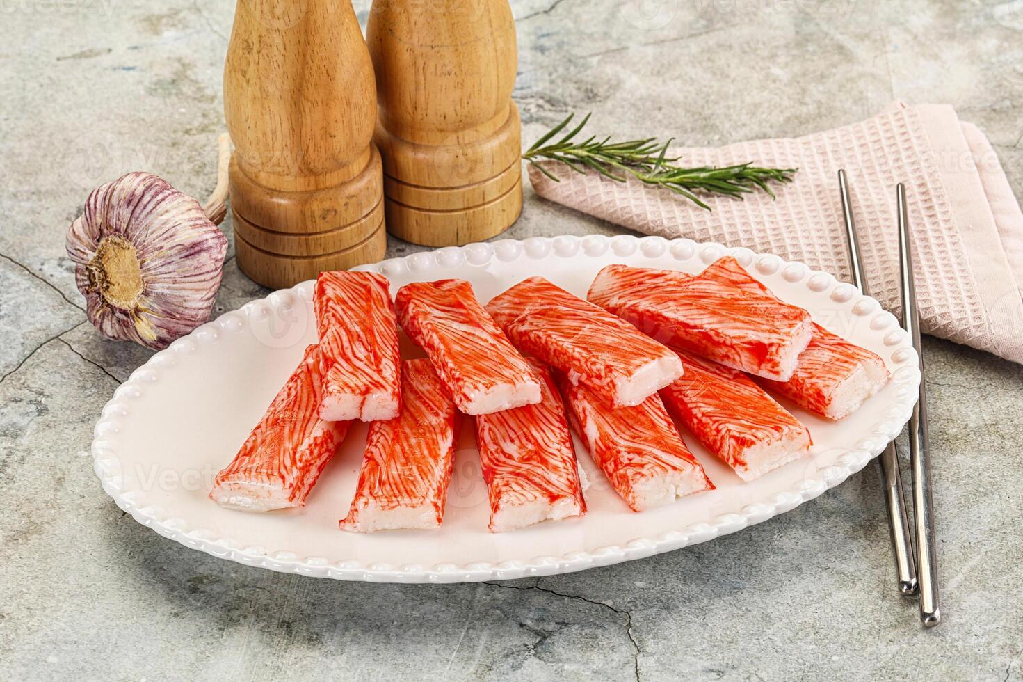 A plate of crab sticks on a counter photo