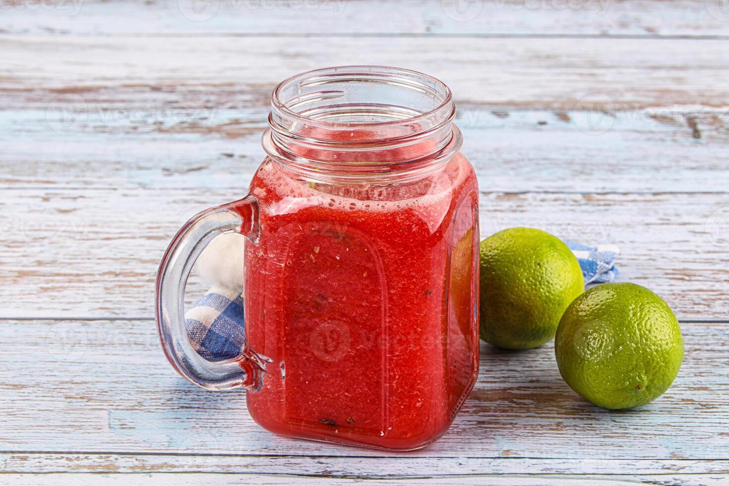 A jar of watermelon and lime juice photo