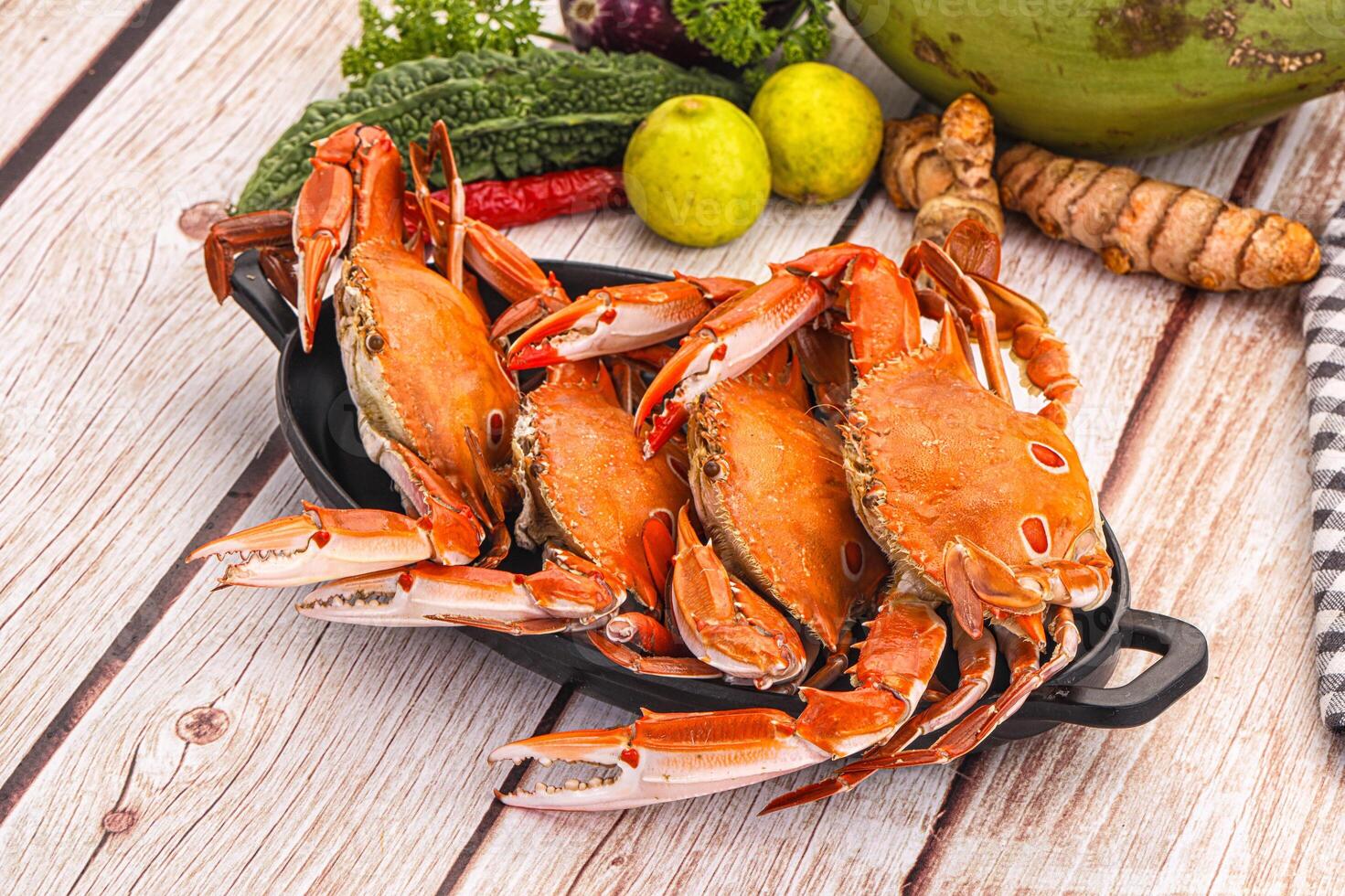 A bunch of crabs on a plate photo
