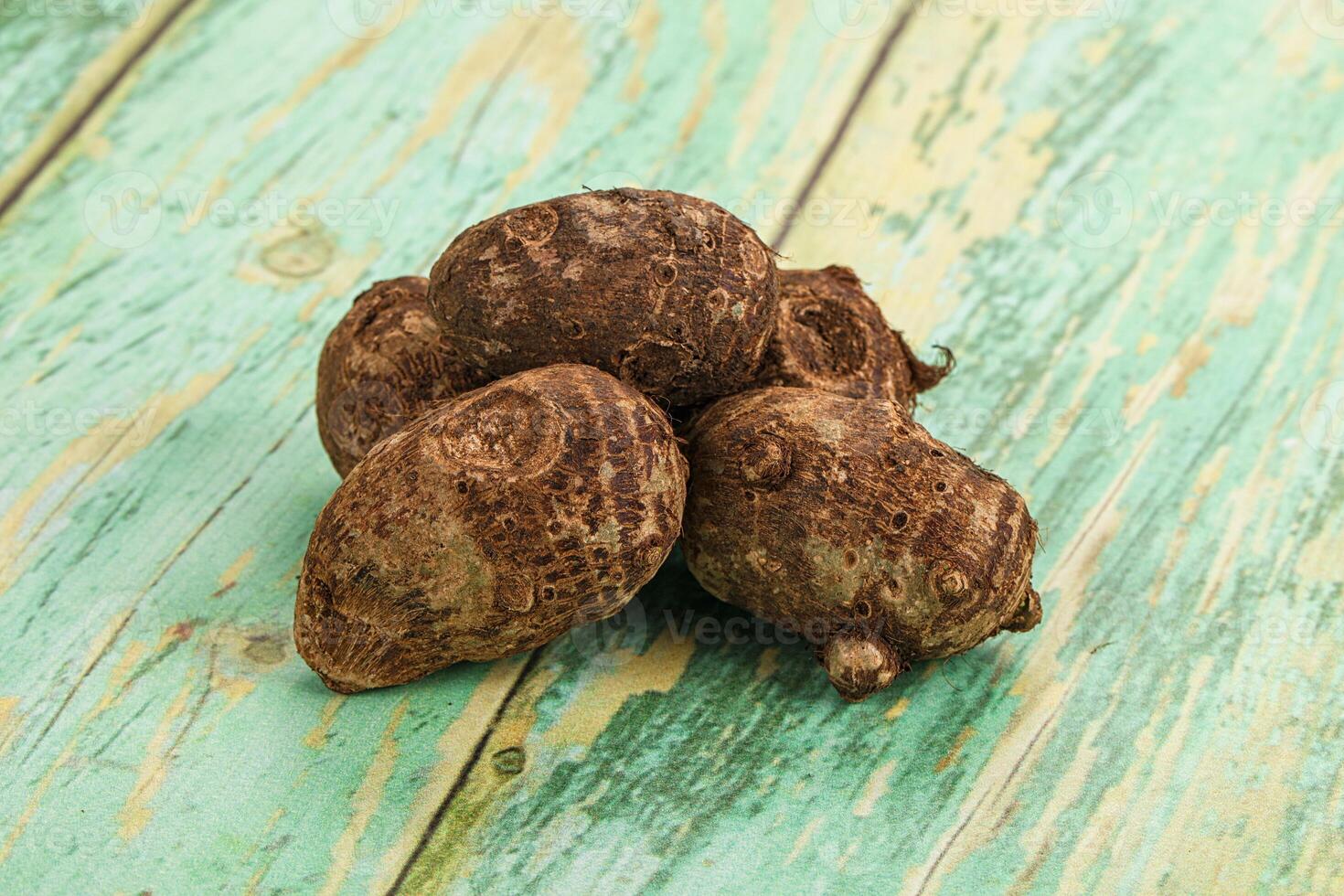 Coconut shell on a wooden table photo