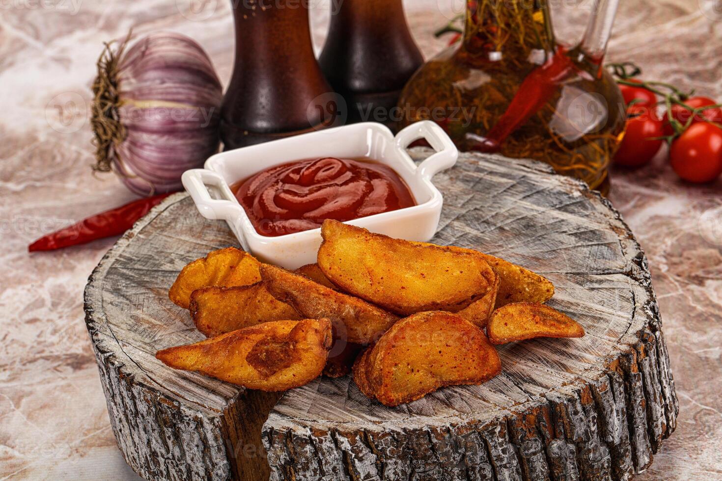 A plate with some fries and ketchup photo