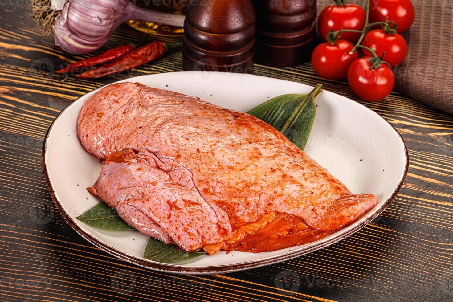 A plate of meat on a table photo