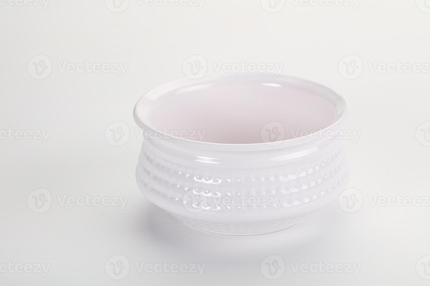 A white cup with a pattern on the side photo