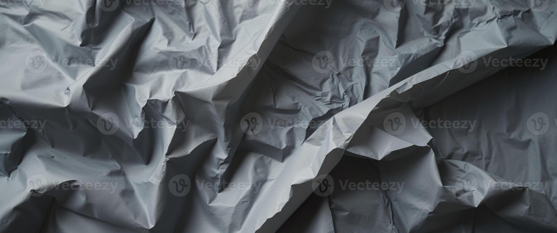 Dark Gray Crumpled Paper Texture Background. photo