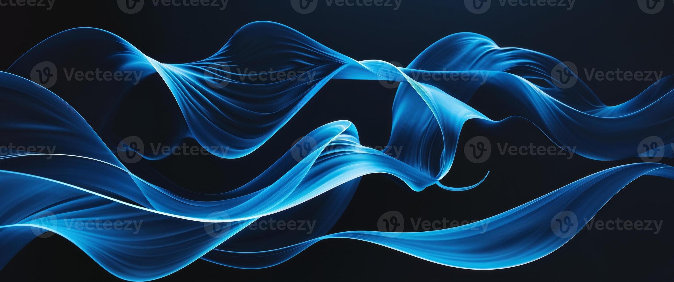 An abstract image of blue lines flowing across black background photo
