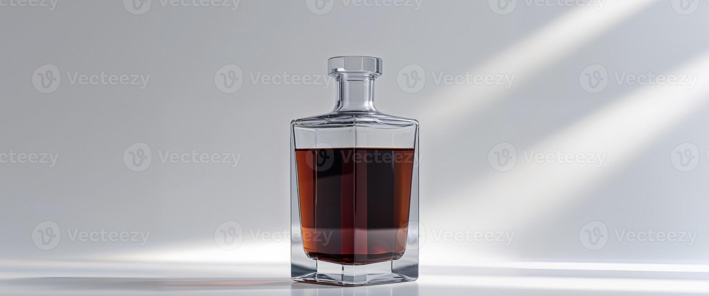 A glass bottle filled with dark liquid perfect for beverage branding and advertising. photo