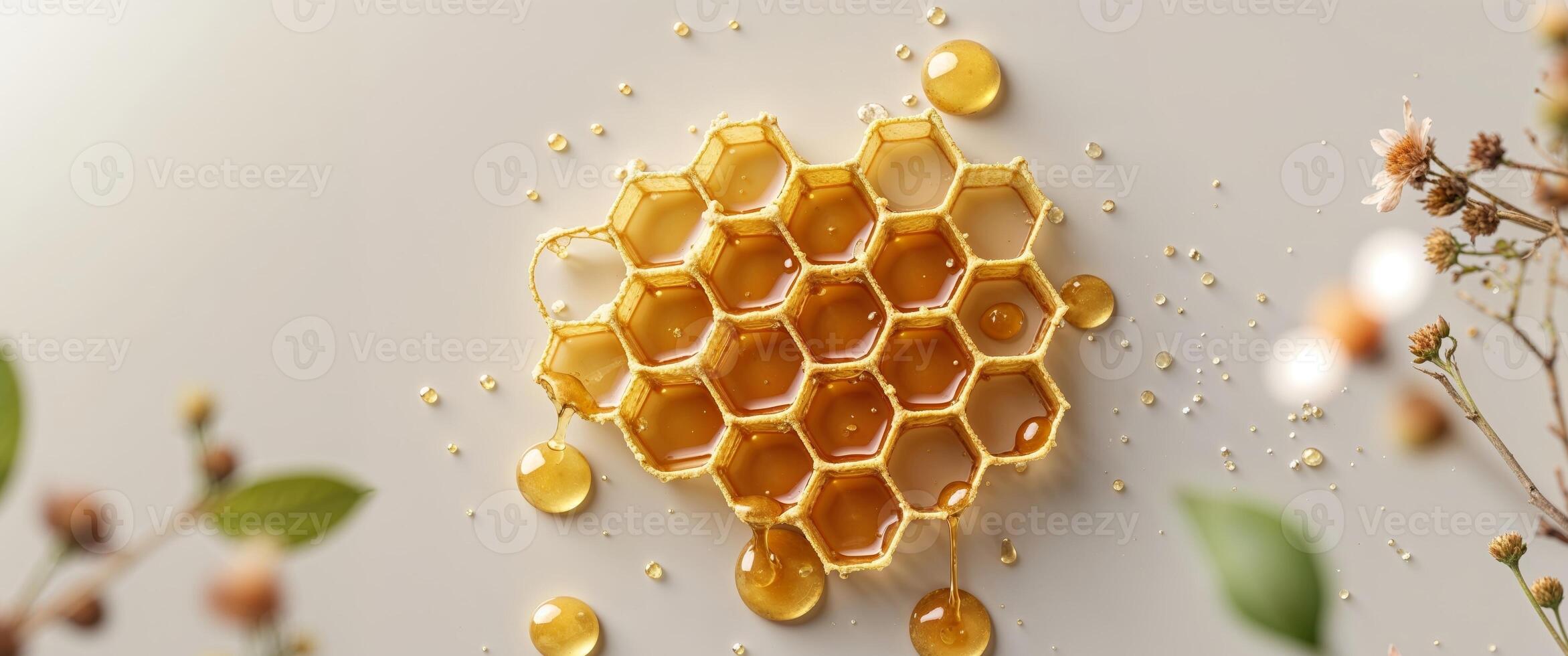 Sweet golden honeycomb with dripping honey and nature's touch photo