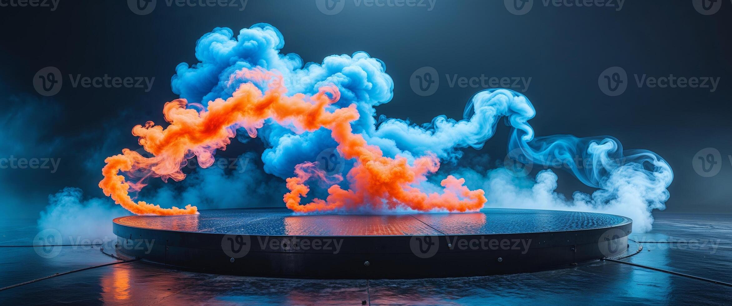A large blue and orange smoke cloud on a stage photo
