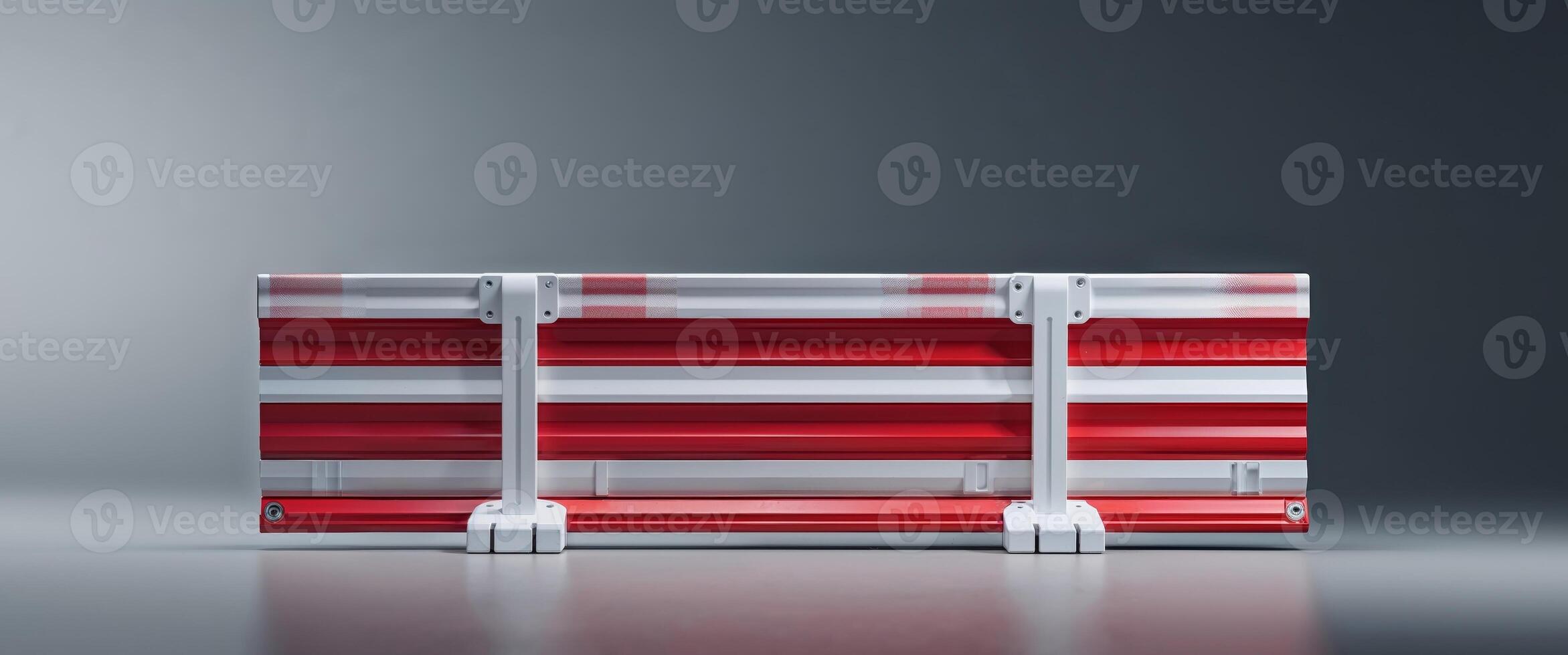 A red and white suitcase with a white handle photo