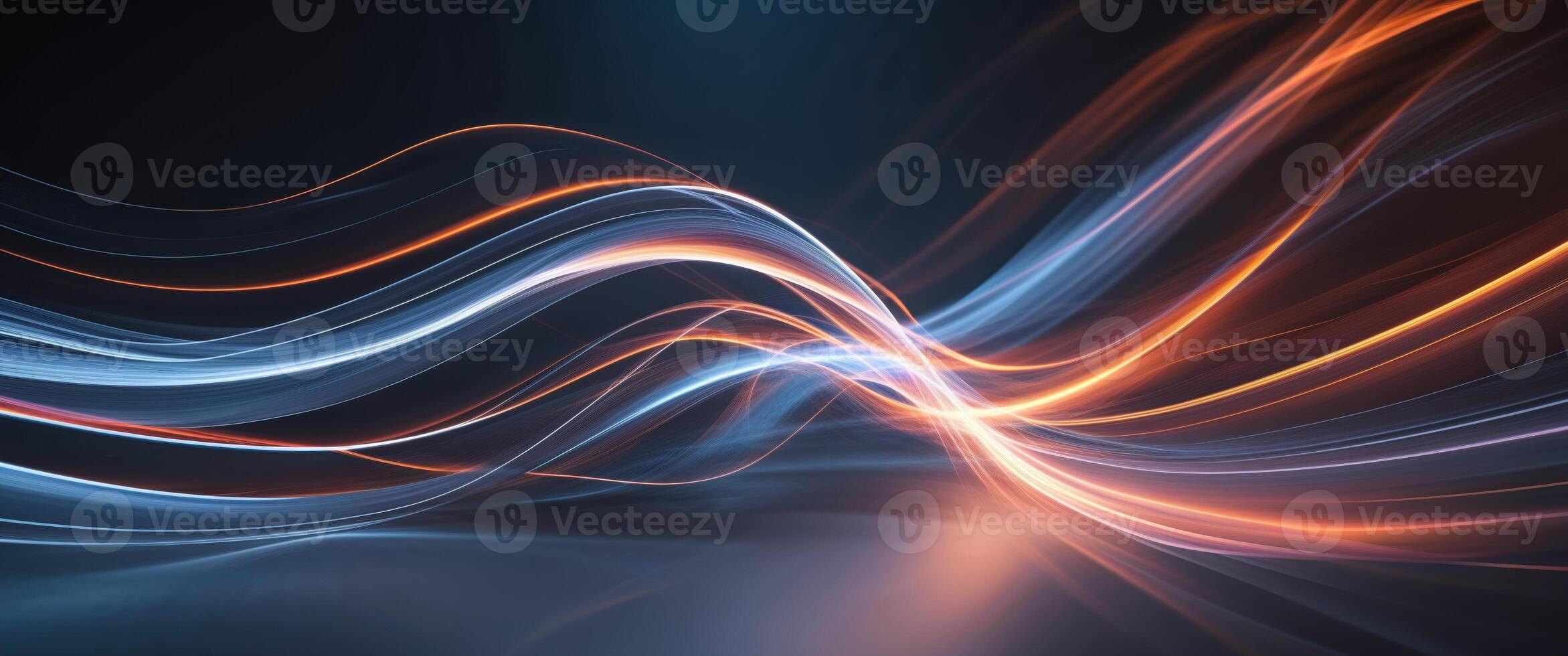Abstract glowing lines flowing across a dark background photo