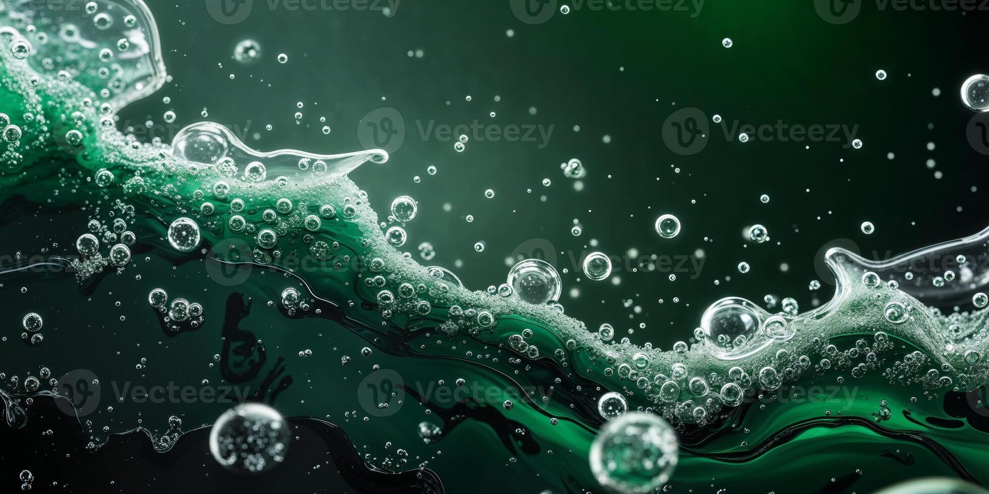A flowing liquid with bubbles across a dark green background photo