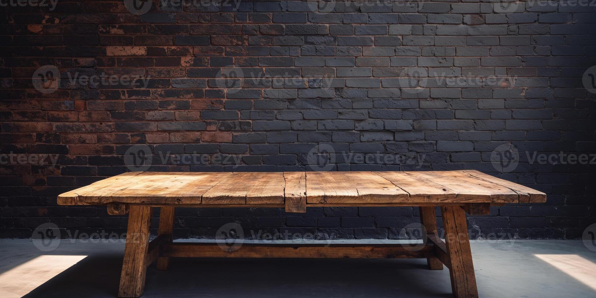 Rustic wooden table on a dark brick wall background with dramatic lighting effects. photo