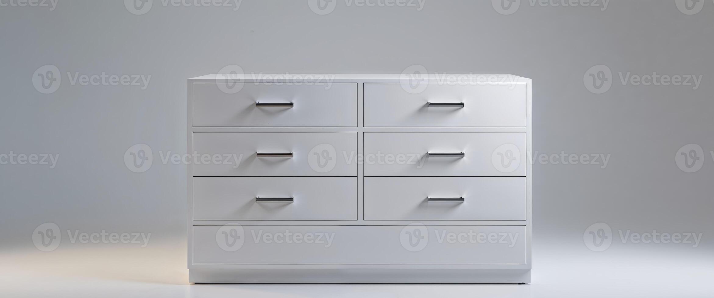 A white cabinet with four drawers and a white base. photo