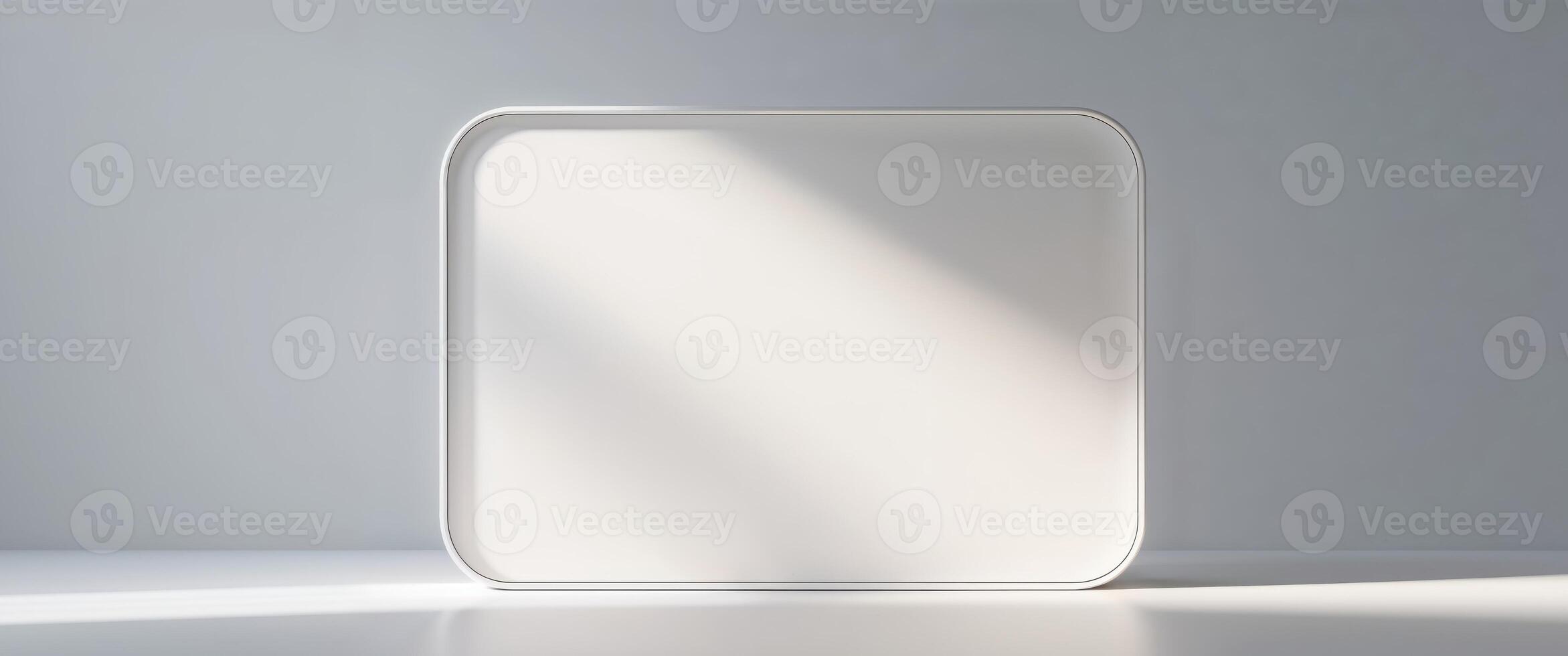 A white rectangular shape appears with soft rounded corners and shadows photo