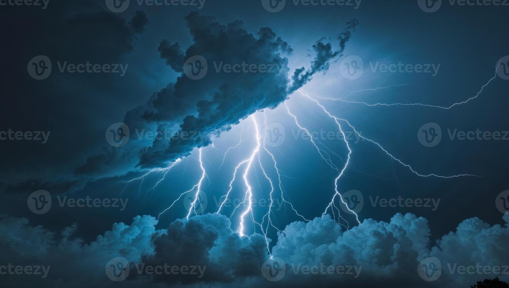Lightning strikes over a dark sky with clouds photo