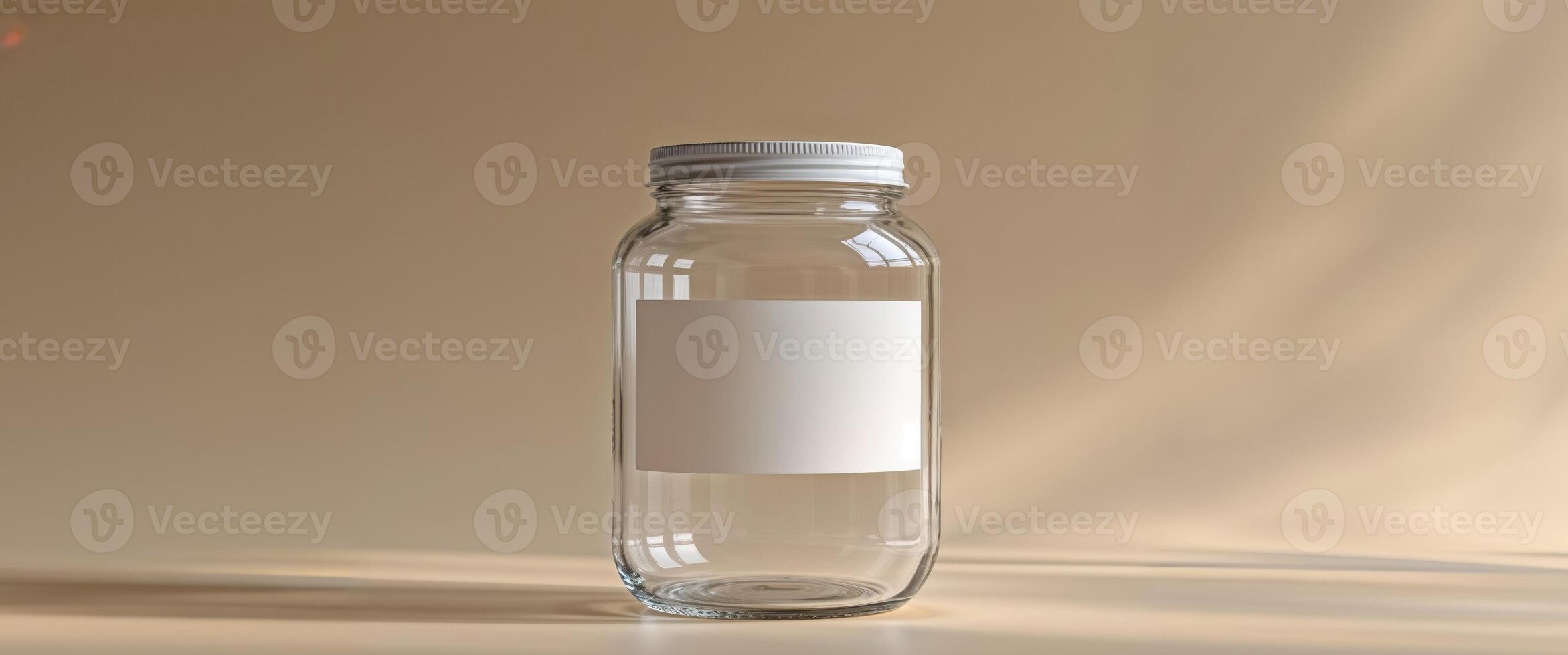 A clear glass bottle with a white label on it photo
