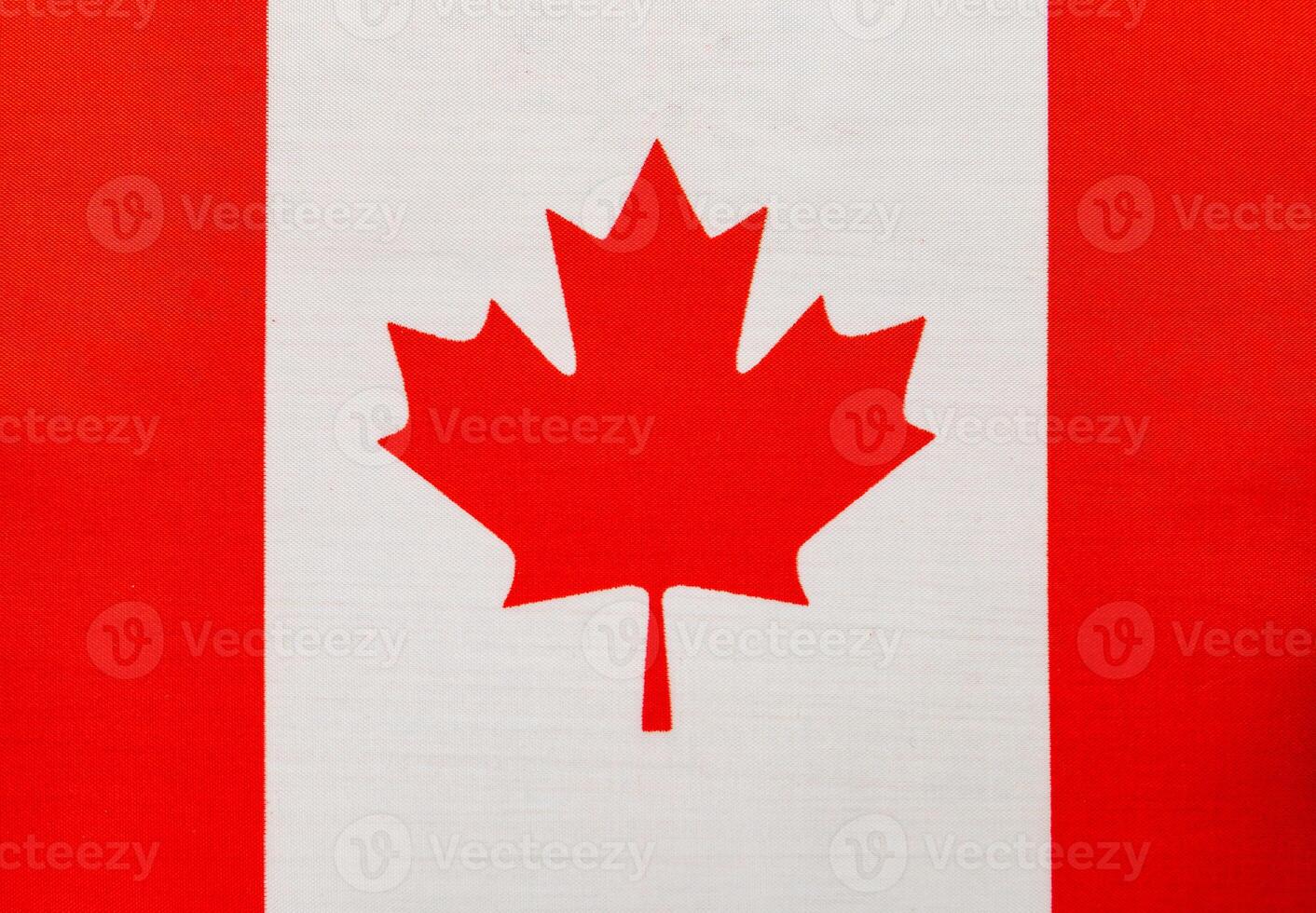 Canada flag displayed prominently in a vibrant setting photo