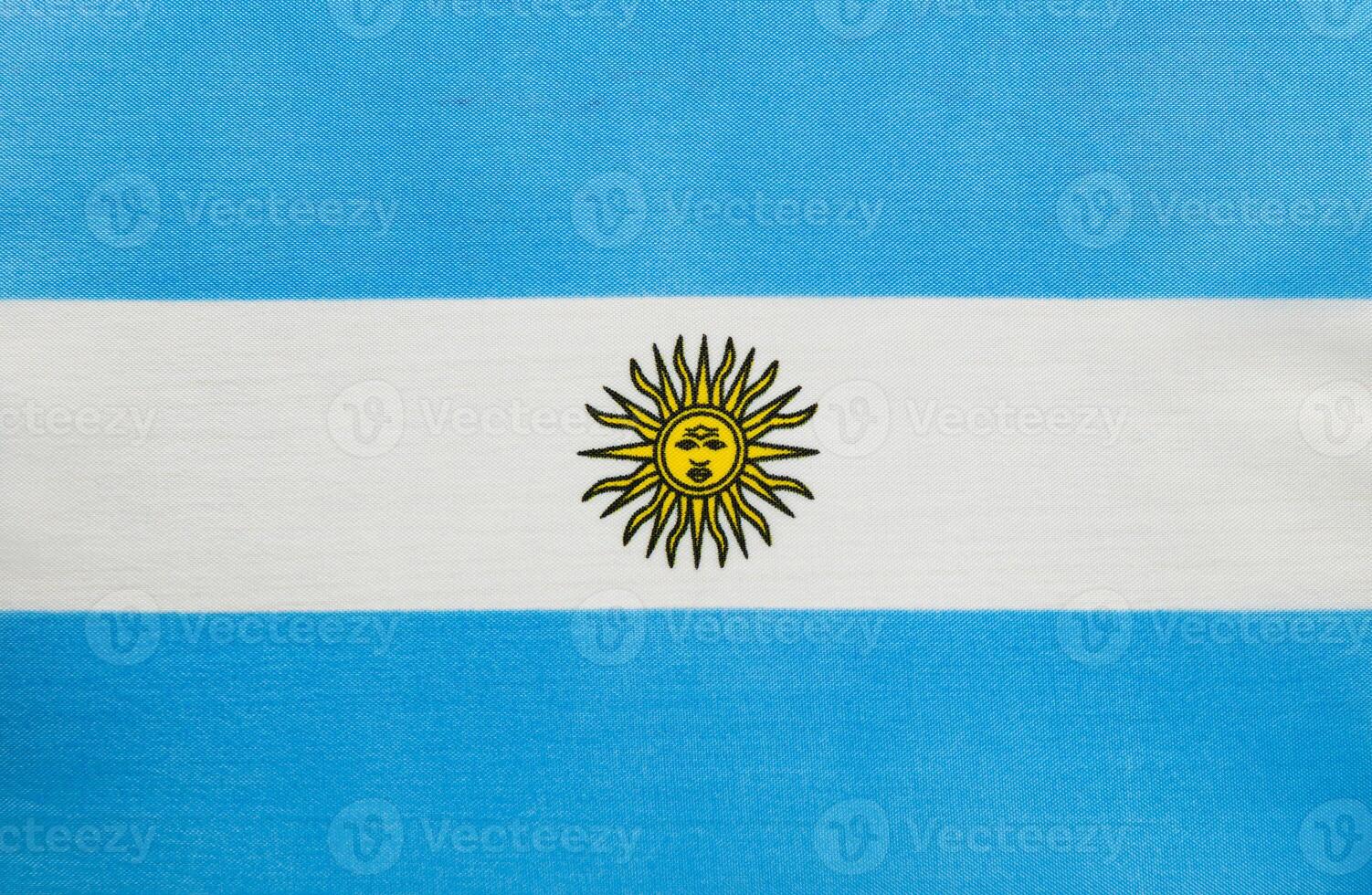Flag of Argentina with sun emblem displayed on fabric photo