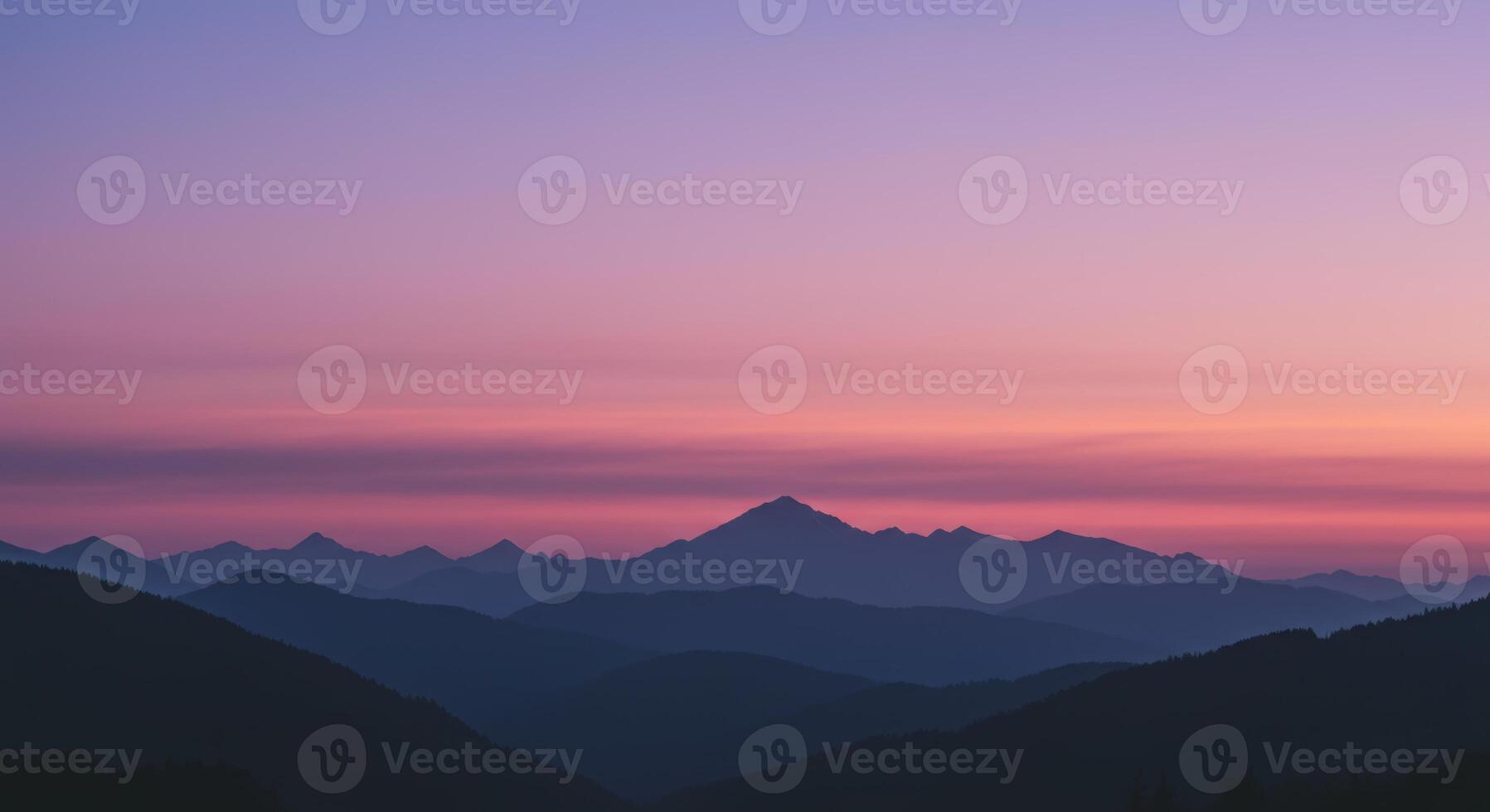 Dramatic Sunset Over Distant Mountains photo