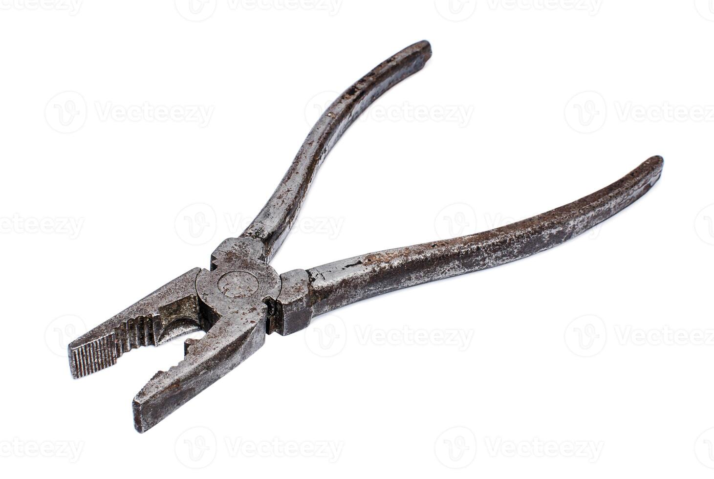 Old shabby pliers on white background photo