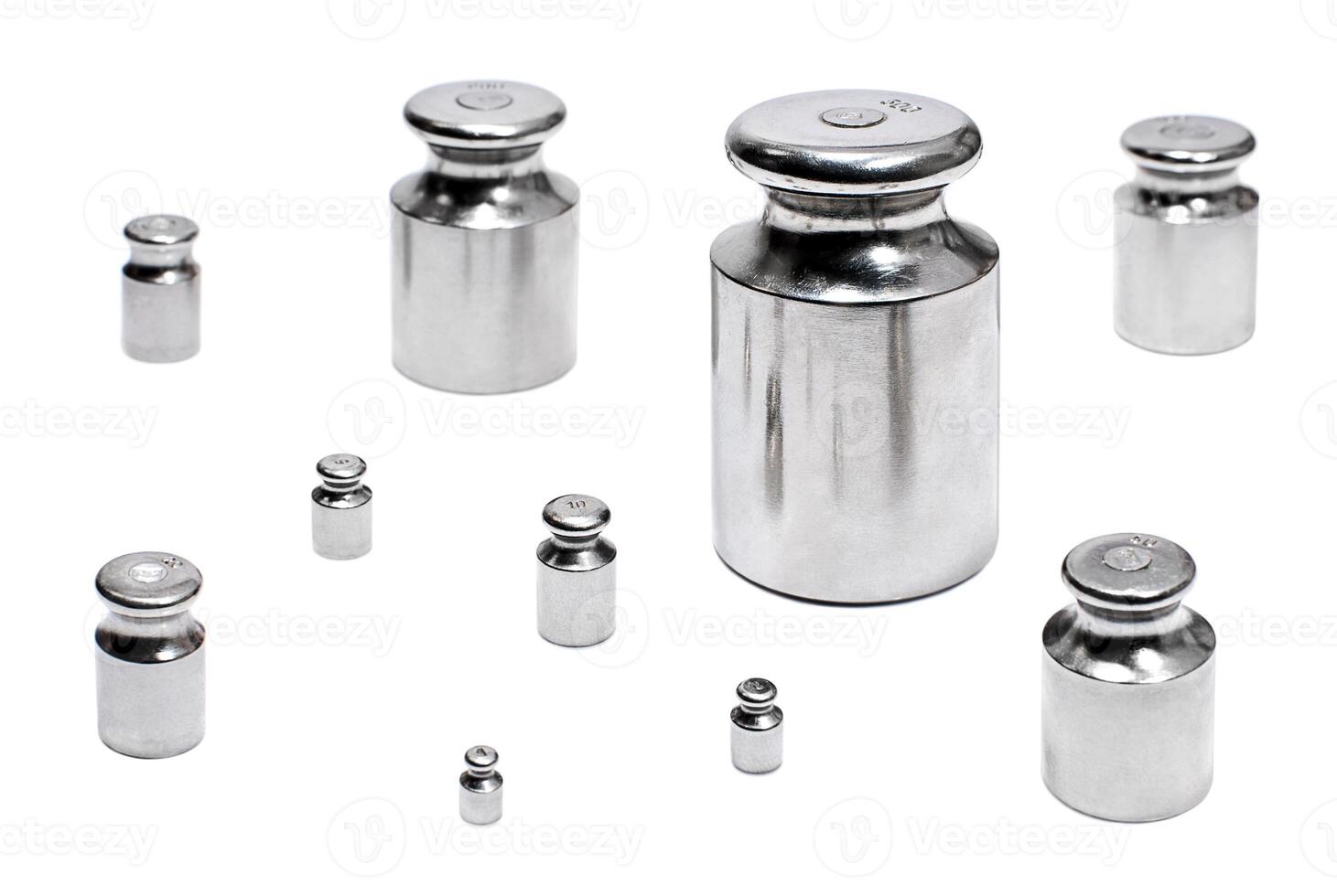 Iron weights for scales on white background photo