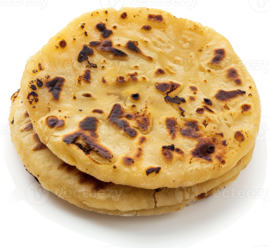 Two golden, crispy, and slightly charred flatbreads stacked on a white plate. png