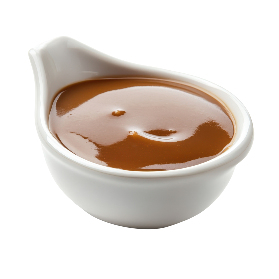 A smooth, light brown dipping sauce in a small white bowl. png