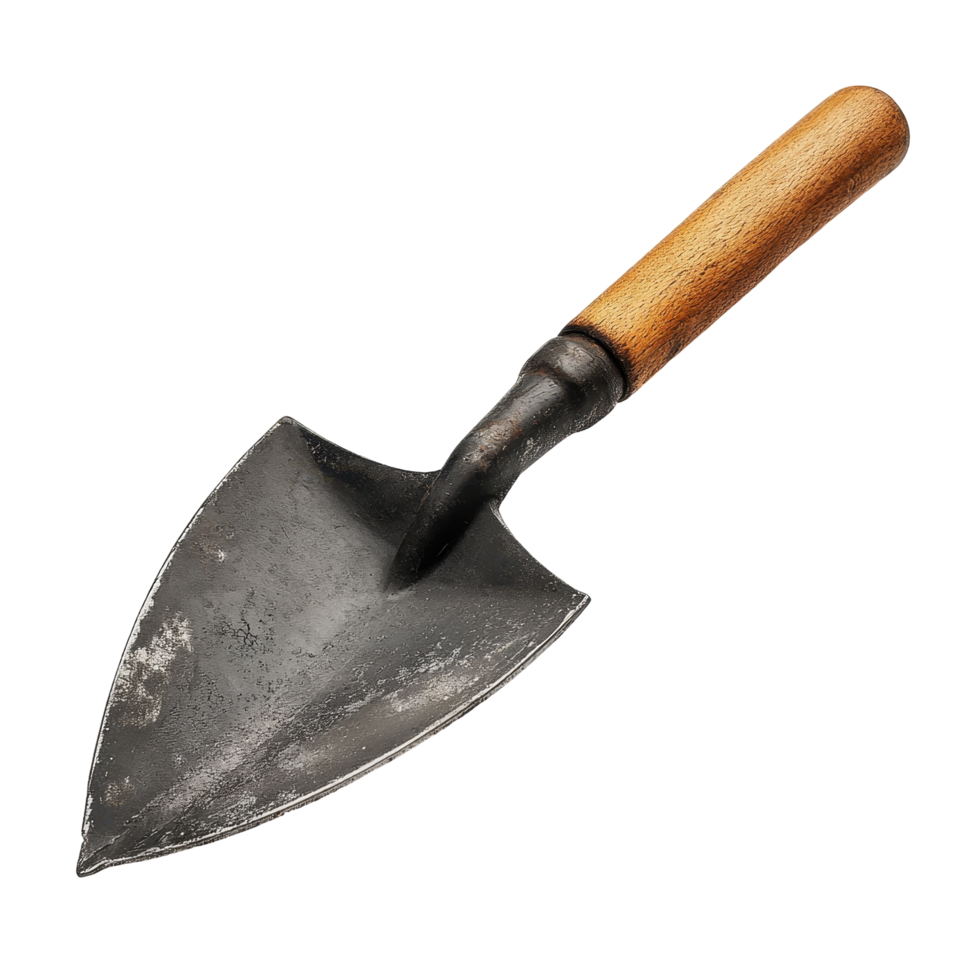 Rusty trowel angled against a mustard backdrop. png