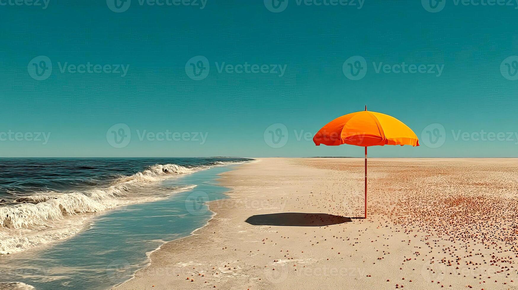 A single colorful beach umbrella perched on an empty beach, with soft golden sand stretching out under a bright, cloudless sky photo