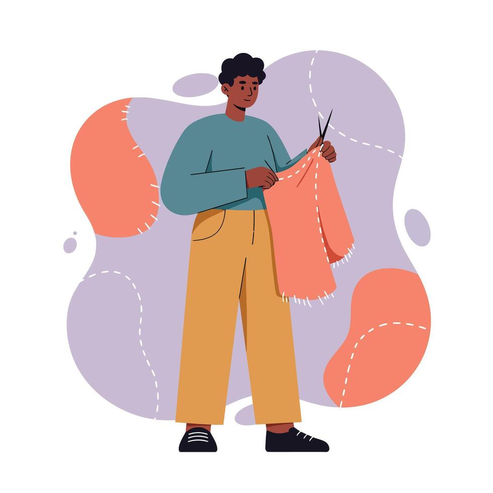 Person cutting orange fabric with scissors in creative textile craft activity indoors vector