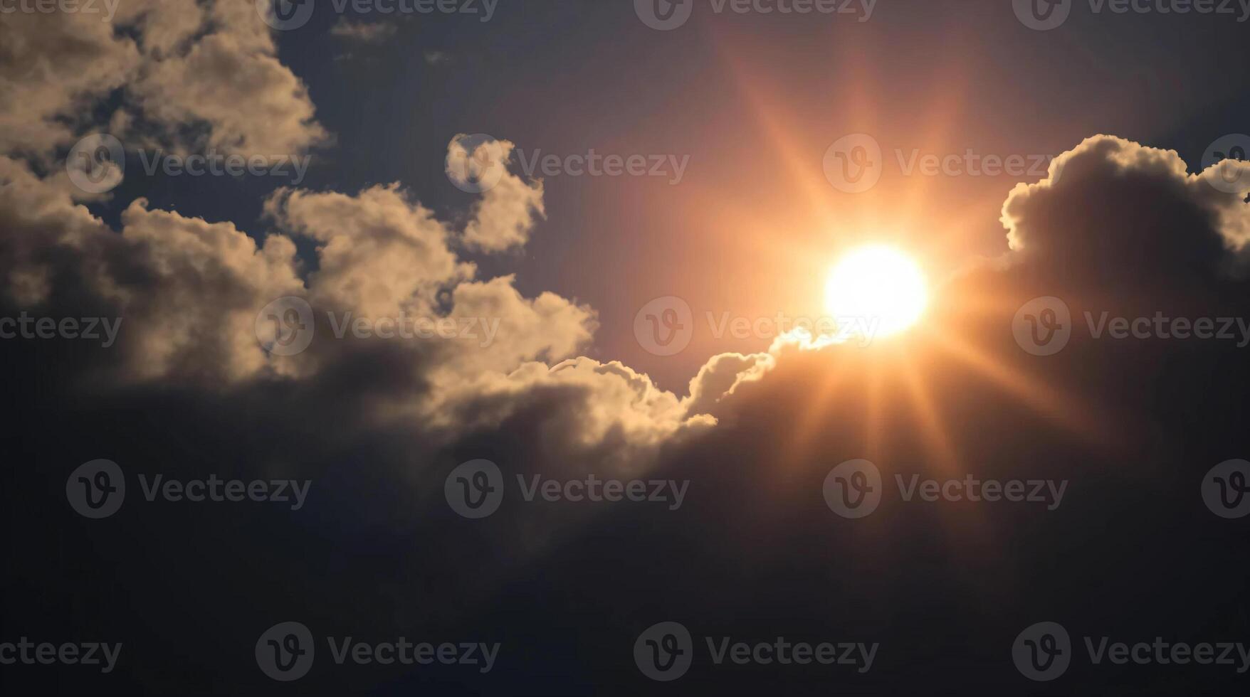 The sun is shining through the clouds in this photo