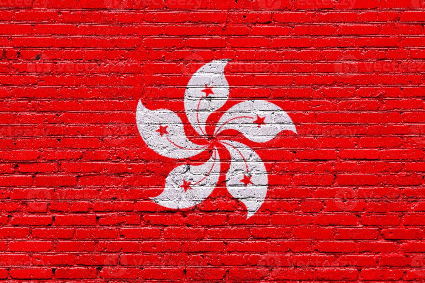 hong kong Red brick wall with white flowers and grunge texture photo
