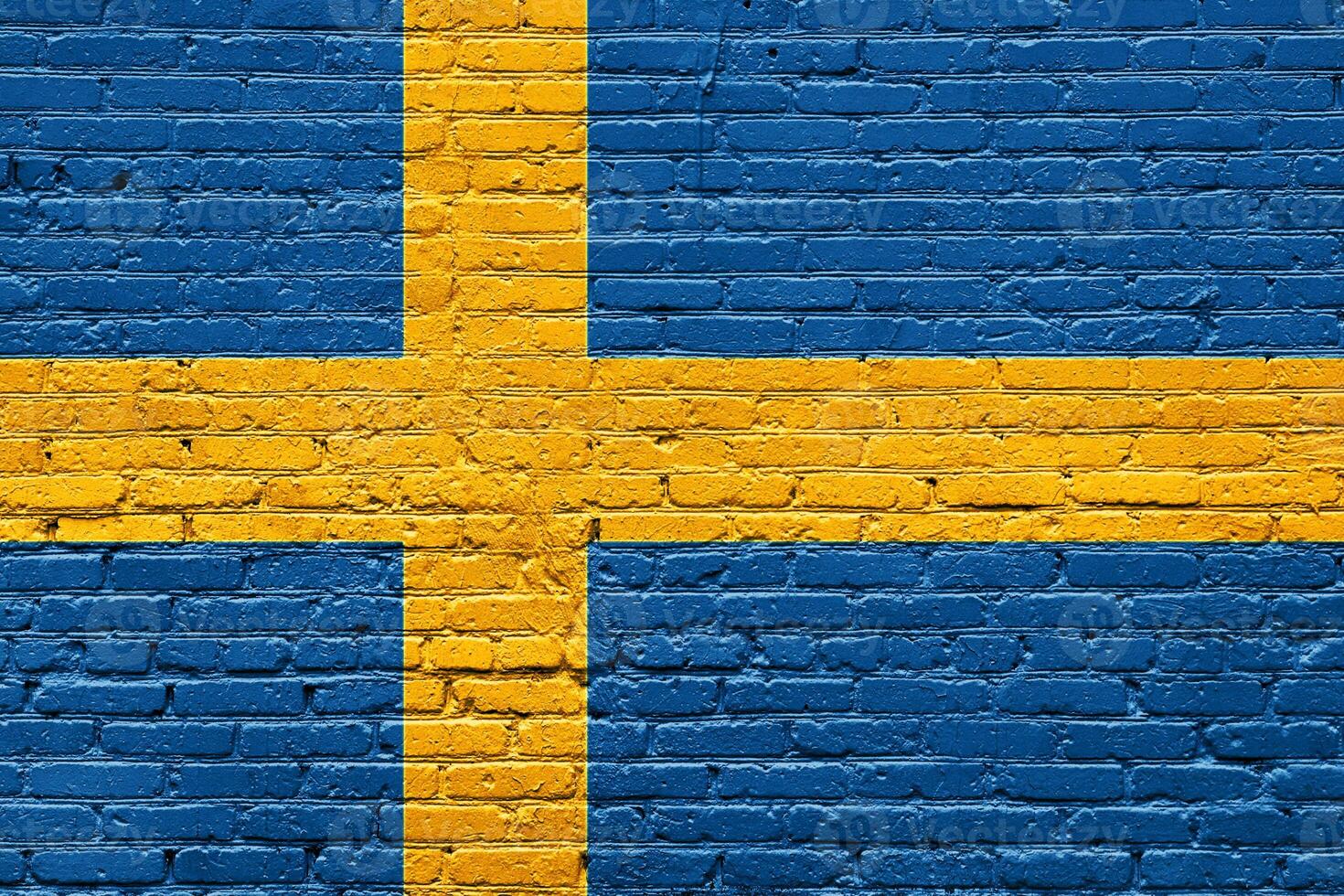 A grunge texture shows the Swedish and Finnish national flags, aged symbols of Nordic countries, with the Swedish blue and yellow cross painted on an old wood plank photo