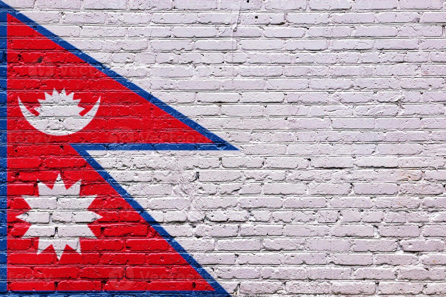 nepal Grunge red brick wall texture with a white arrow sign photo