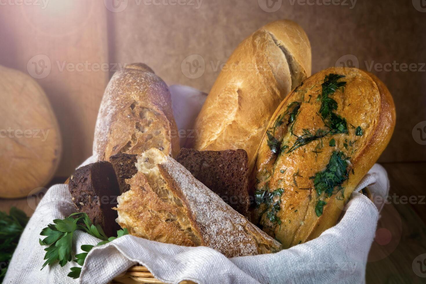 Fresh bread, buckwheat bread, garlic bread, baguette photo