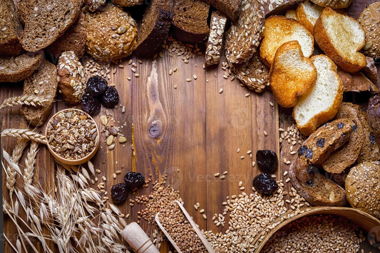 baked bread on wooden table background photo