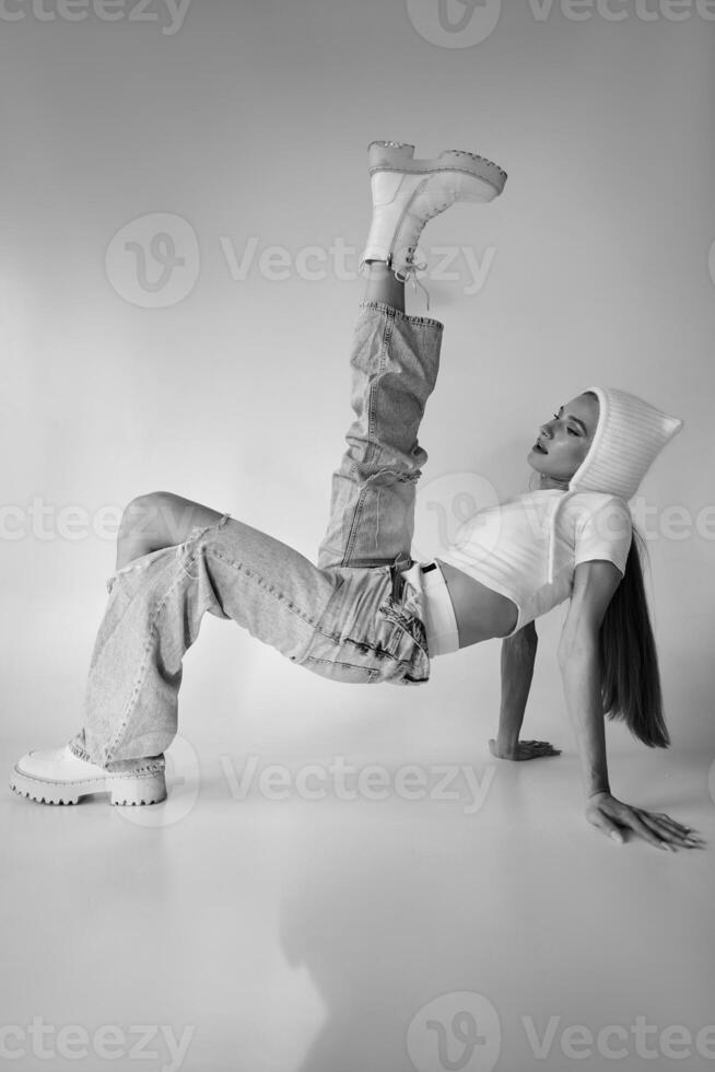 Dynamic Dancer in a Modern Studio Pose photo