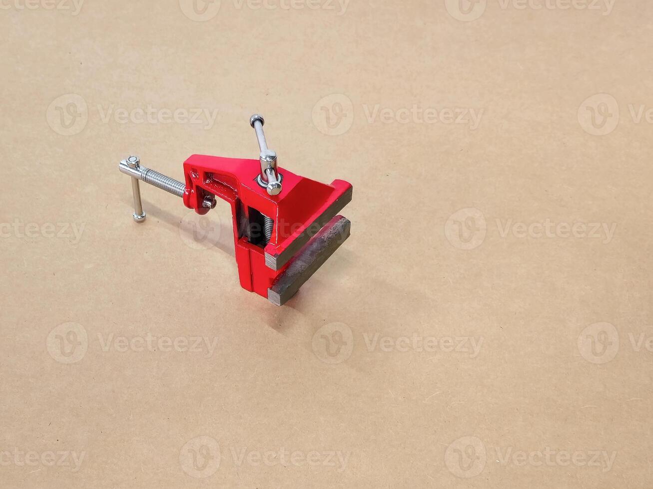 Small red vise close up. photo