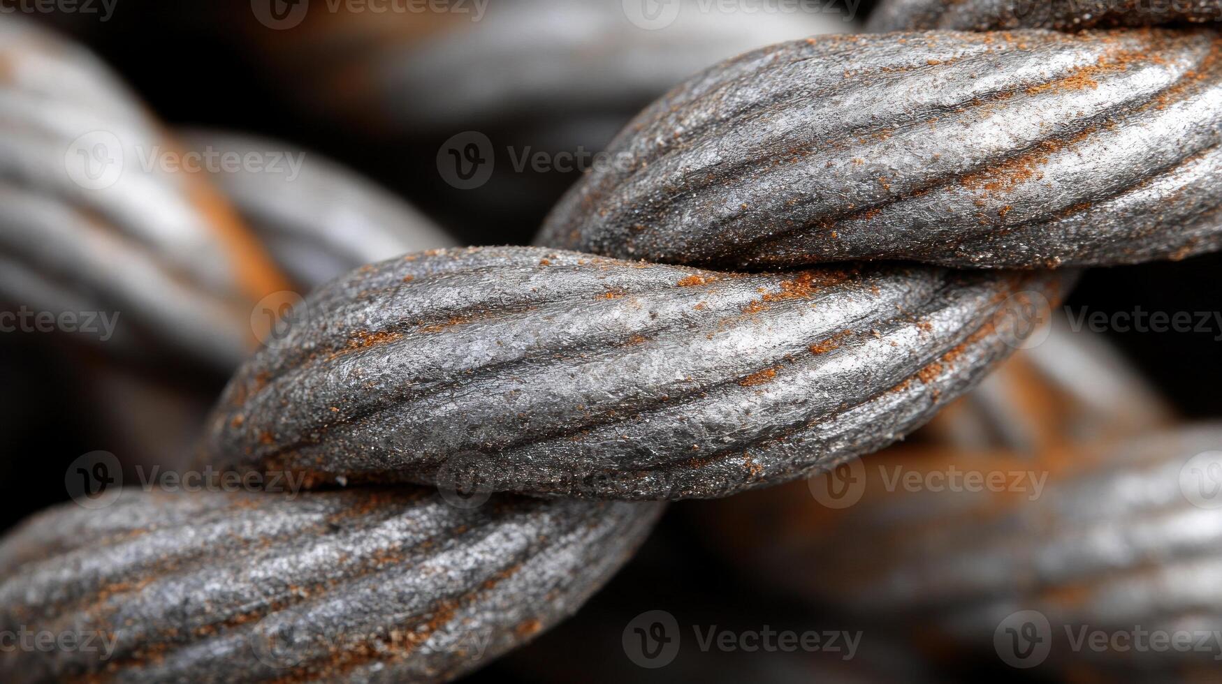 Close-up of twisted metal wire rope with rust. photo