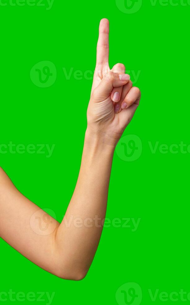 Hand gesture indicating number one with a green background during a creative or educational activity photo