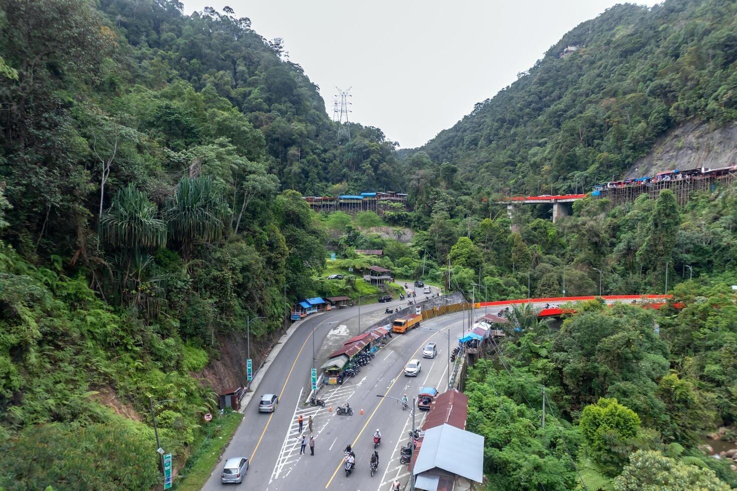 West Sumatra, Indonesia, 2025 - View of Kelok 9 or Nine sharp turns, located in Payakumbuh, West Sumatra. A historic road connecting Riau and West Sumatra. photo