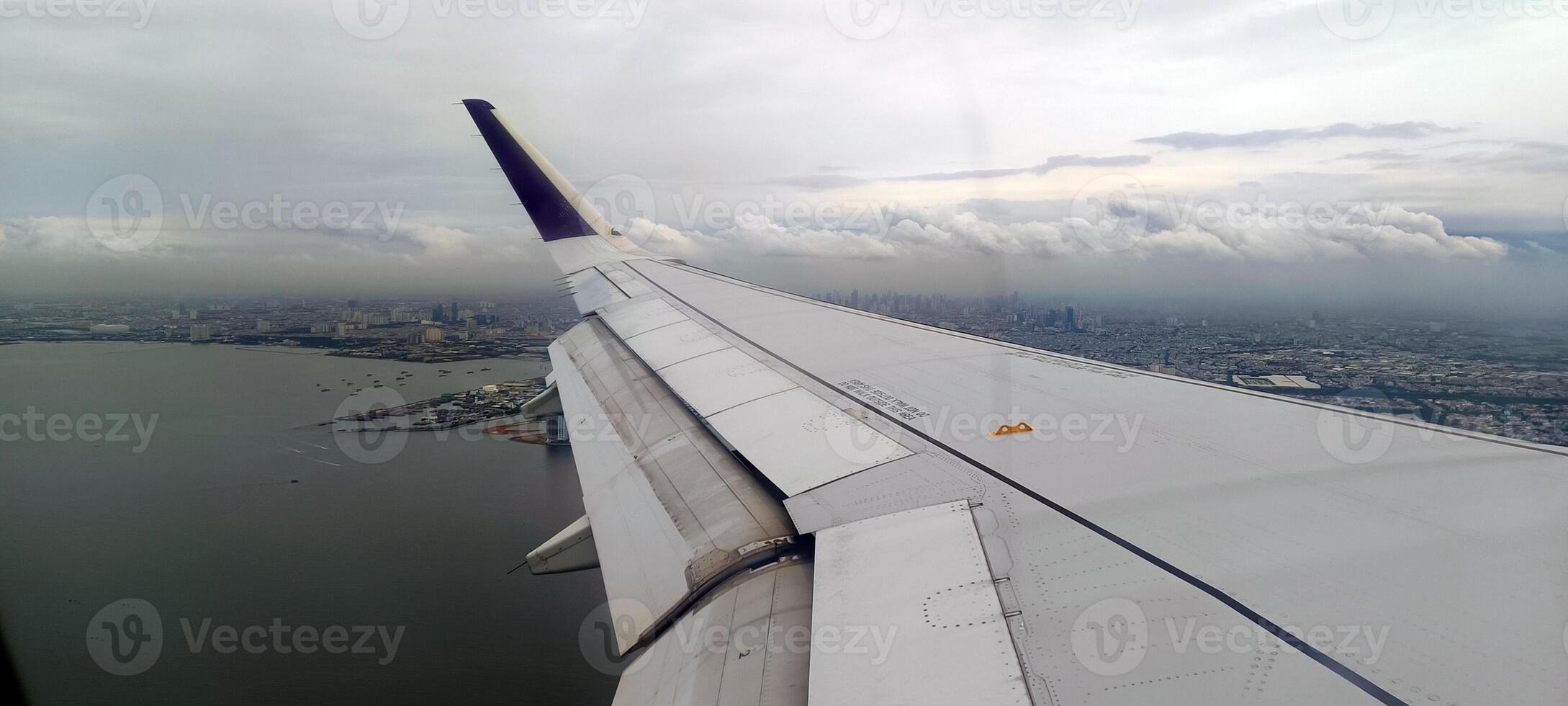 13. View of the island and sea from the airplane window photo