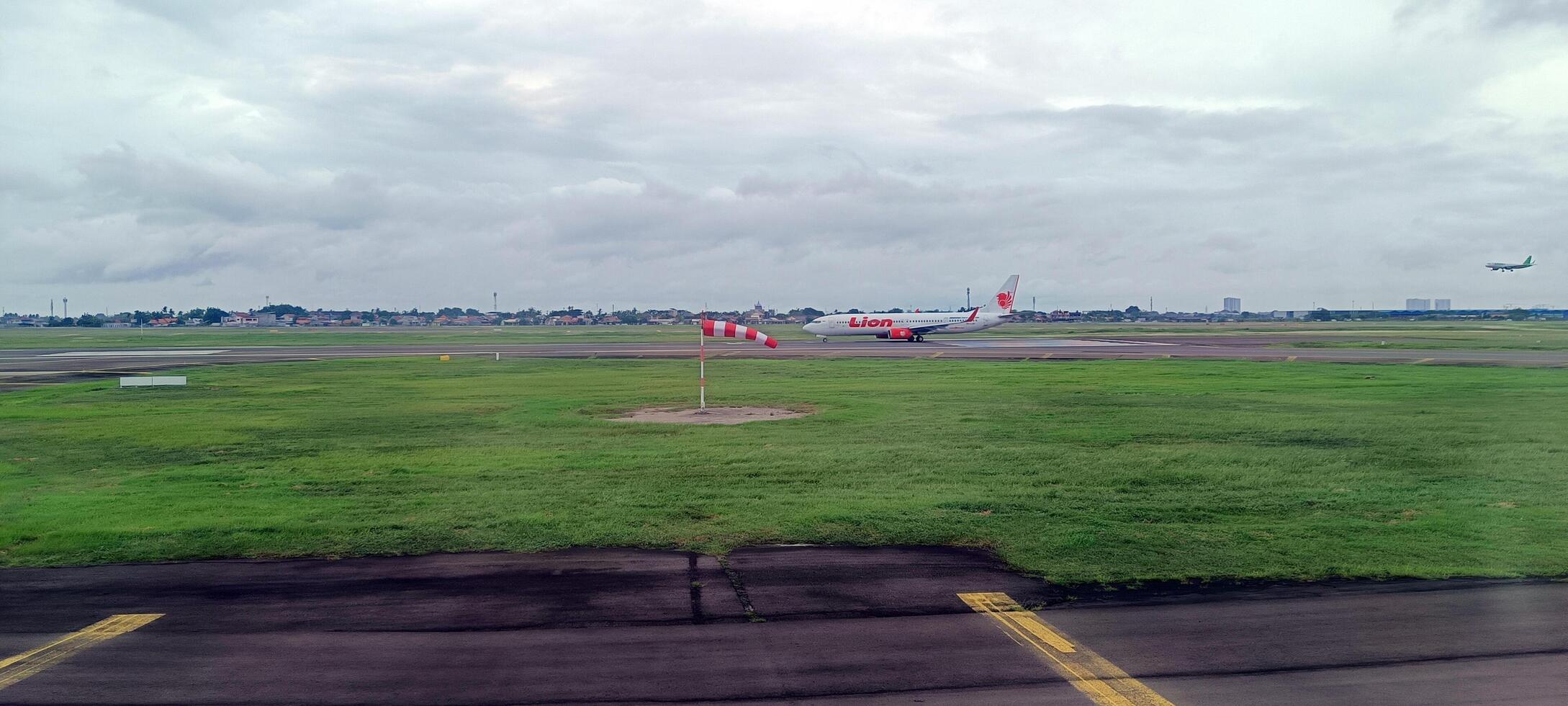 5. 22 October 2024, View of Lion Air Plane at the airport runway photo